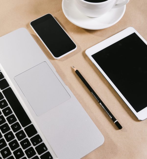 laptop-notepad-tablet-cup-espresso-table laptop-notepad-tablet-cup-espresso-table